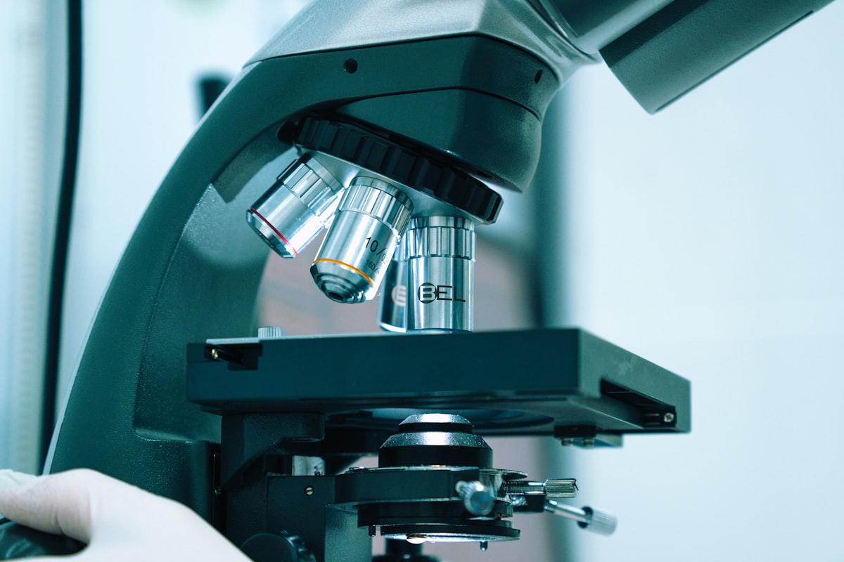 Microscope in a laboratory, research into the root cause of bone loss